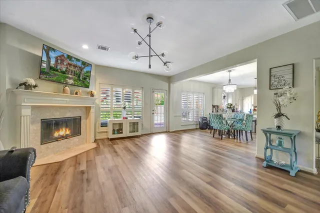 a kitchen with cabinets appliances and a window