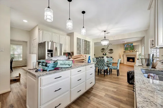 a bedroom with bed and a flat tv screen