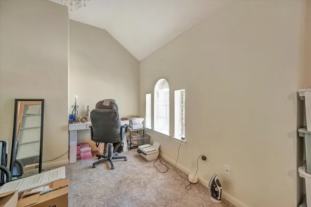 a view of a workspace with furniture