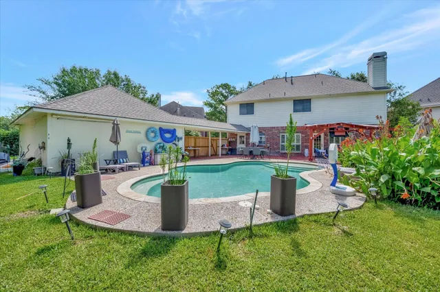 a view of a house with a swimming pool