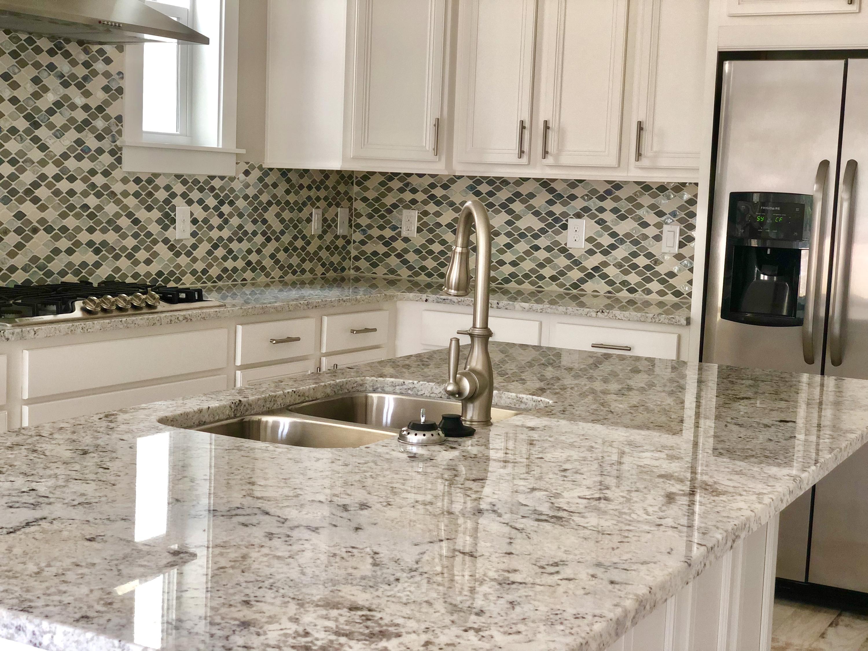 84 Dune Comet Ln Inlet Beach, Unit B Inlet Beach, FL 32461 - Photo 4 of 27 a kitchen with granite countertop a sink and a granite counter tops