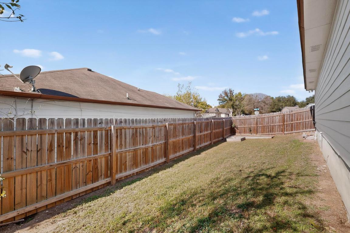2511 Ashley Way Austin, TX 78744 - Photo 22 of 23 View of fenced side yard, lots of space