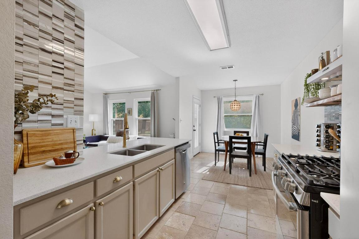 2511 Ashley Way Austin, TX 78744 - Photo 10 of 23 Kitchen featuring appliances with stainless steel f