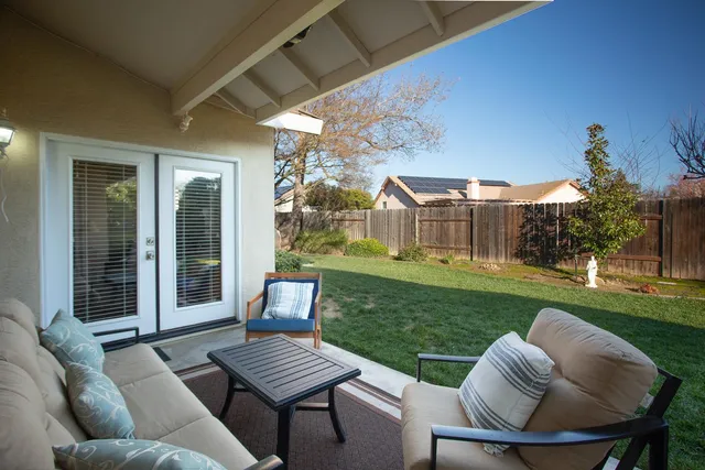 a view of yard with outdoor seating