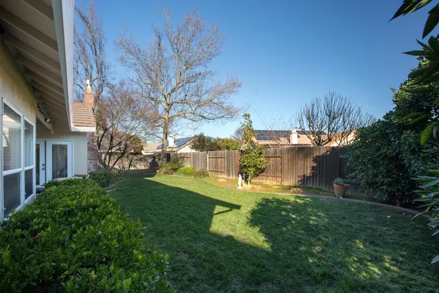 a view of a back yard of the house