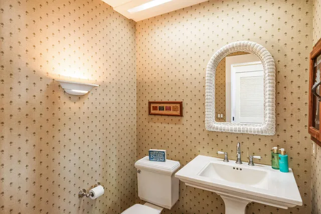 a view of a hallway with windows