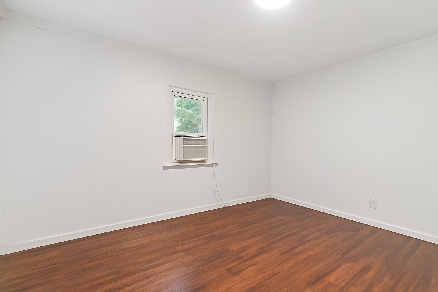 309 Harris Street Madison, TN 37115 - Photo 15 of 52 a view of a room with wooden floor and windows
