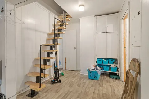 a kitchen with cabinets a sink and appliances