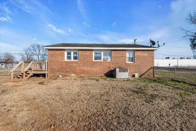 a house view with a backyard space