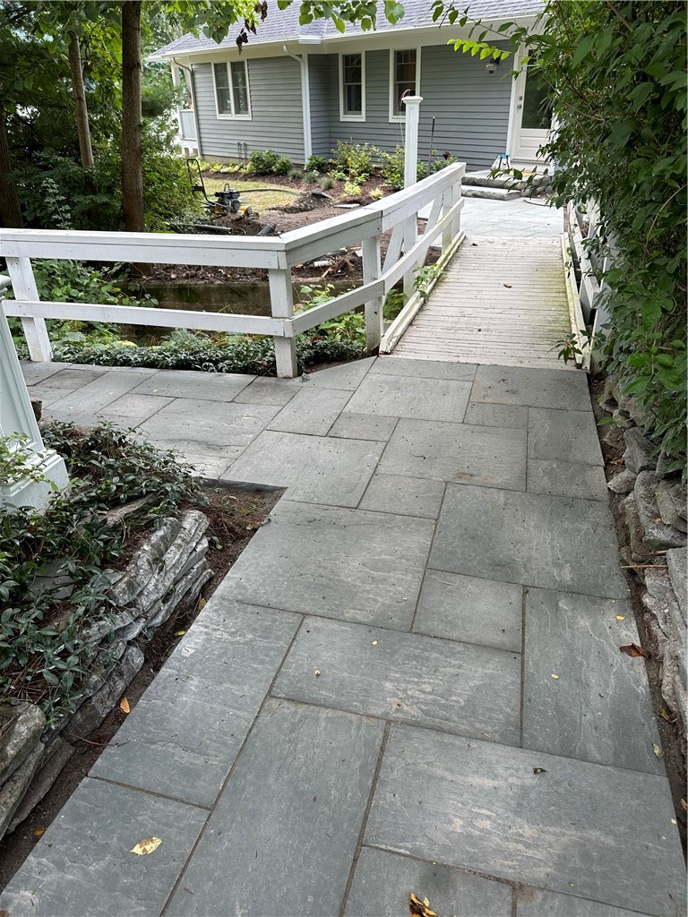 6985 State Rte 21 South Bristol, NY 14512 - Photo 38 of 50 Quaint bridge leads from the garage with workshop/