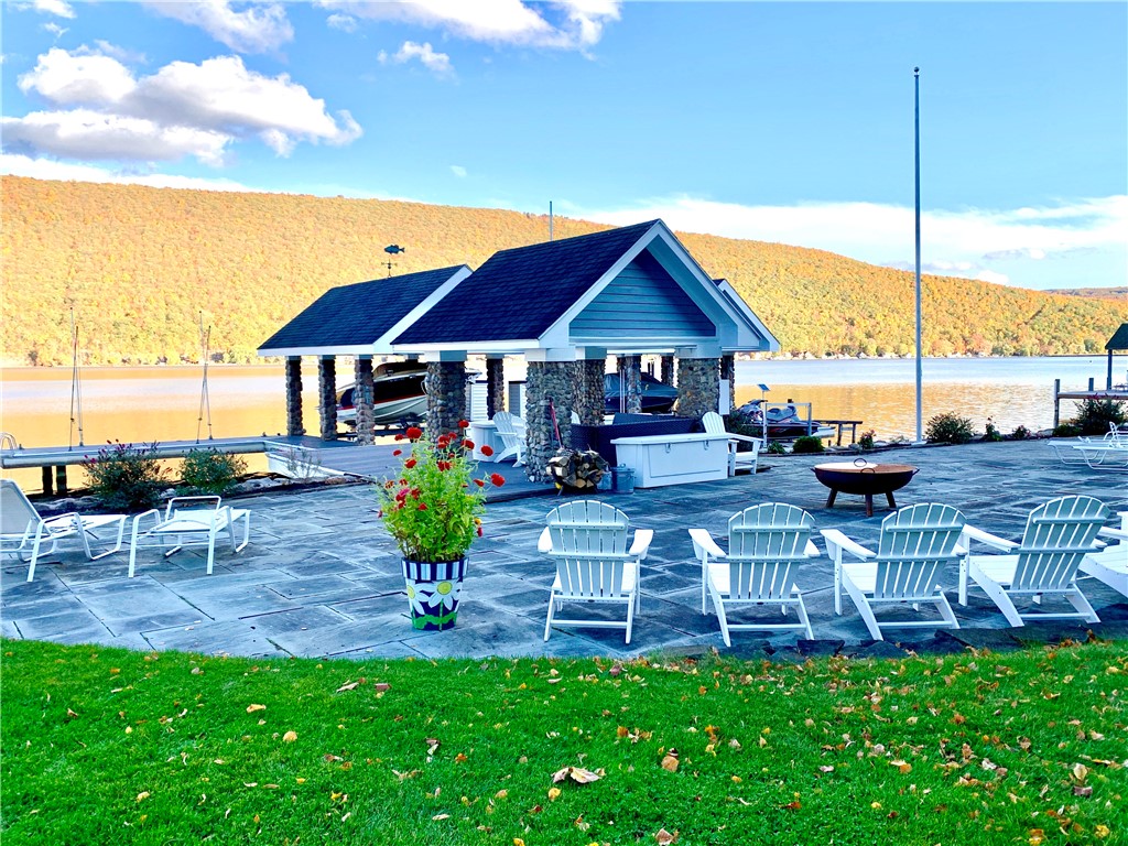 6985 State Rte 21 South Bristol, NY 14512 - Photo 39 of 50 Enormous stone patio with a permanent pavilion all