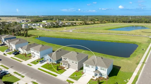 a view of swimming pool with outdoor seating