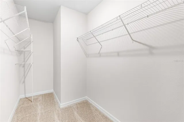 a view of small space with racks on the wall