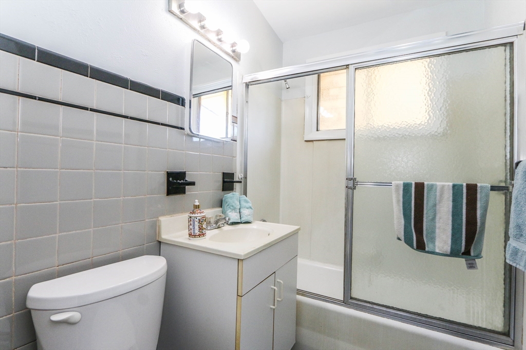 31 Fieldston Street Springfield, MA 01119 - Photo 26 of 32 a bathroom with a sink a toilet and shower