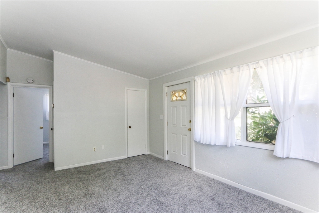 31 Fieldston Street Springfield, MA 01119 - Photo 5 of 32 a view of an empty room with a window