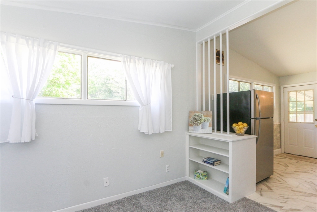 31 Fieldston Street Springfield, MA 01119 - Photo 8 of 32 a view of room with window and furniture