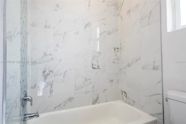 a bathroom with a bathtub