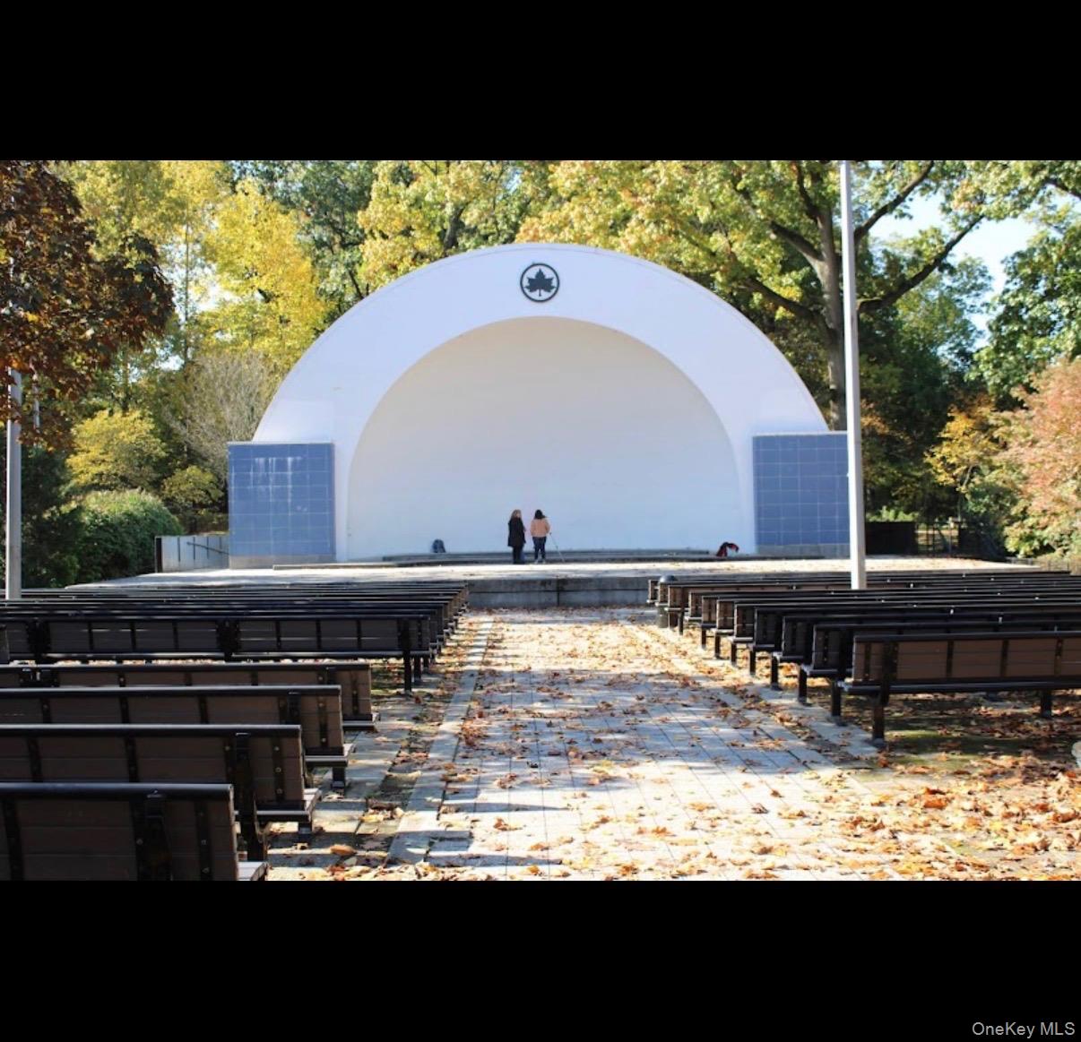 86-19 79th Street Queens, NY 11421 - Photo 19 of 19 a view of a swimming pool with a outdoor seating