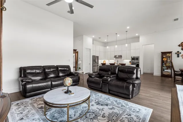 a living room with furniture a rug and a couch
