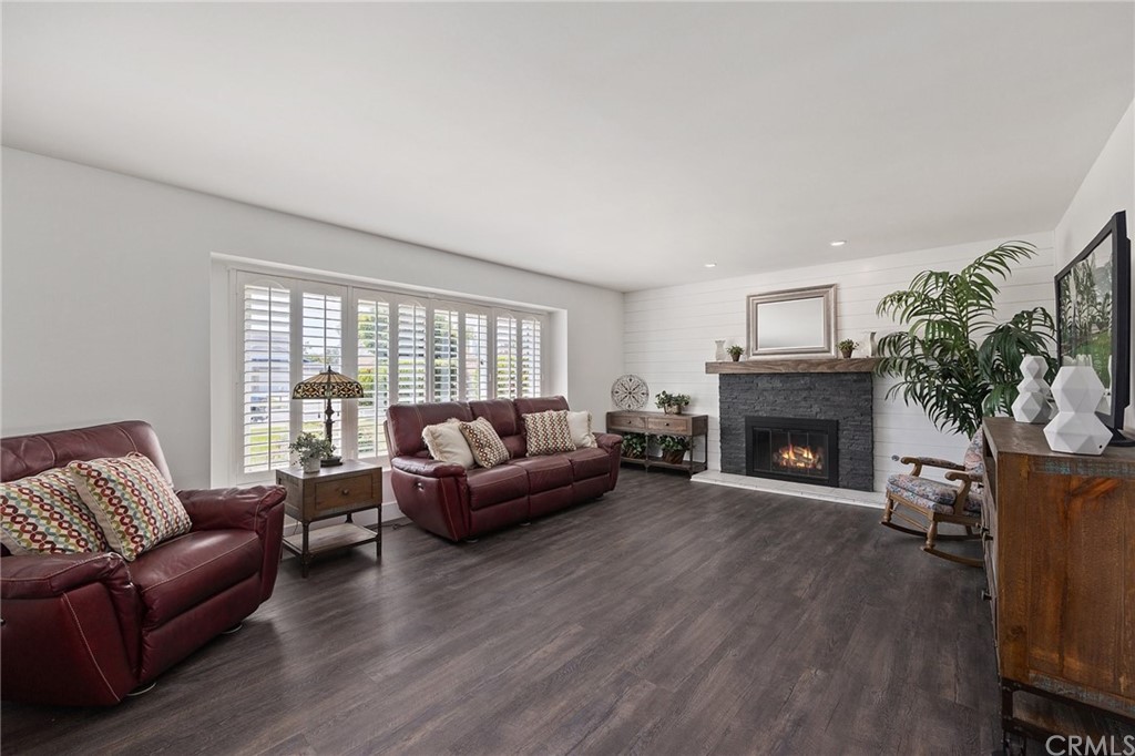 394 Tolbert Street Brea, CA 92823 - Photo 4 of 21 a living room with furniture and a fireplace