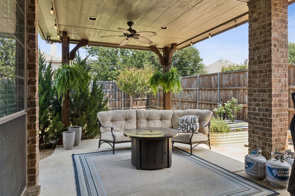 910 Fox Ridge Trail Prosper, TX 75078 - Photo 19 of 25 a view of a patio with couches and potted plants