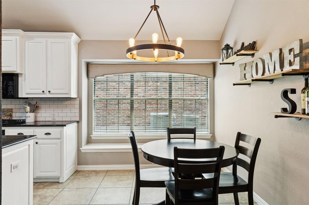 910 Fox Ridge Trail Prosper, TX 75078 - Photo 7 of 25 a view of a dining room with furniture and a window