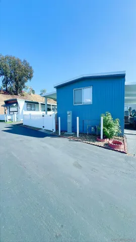 a view of an empty room with a fireplace
