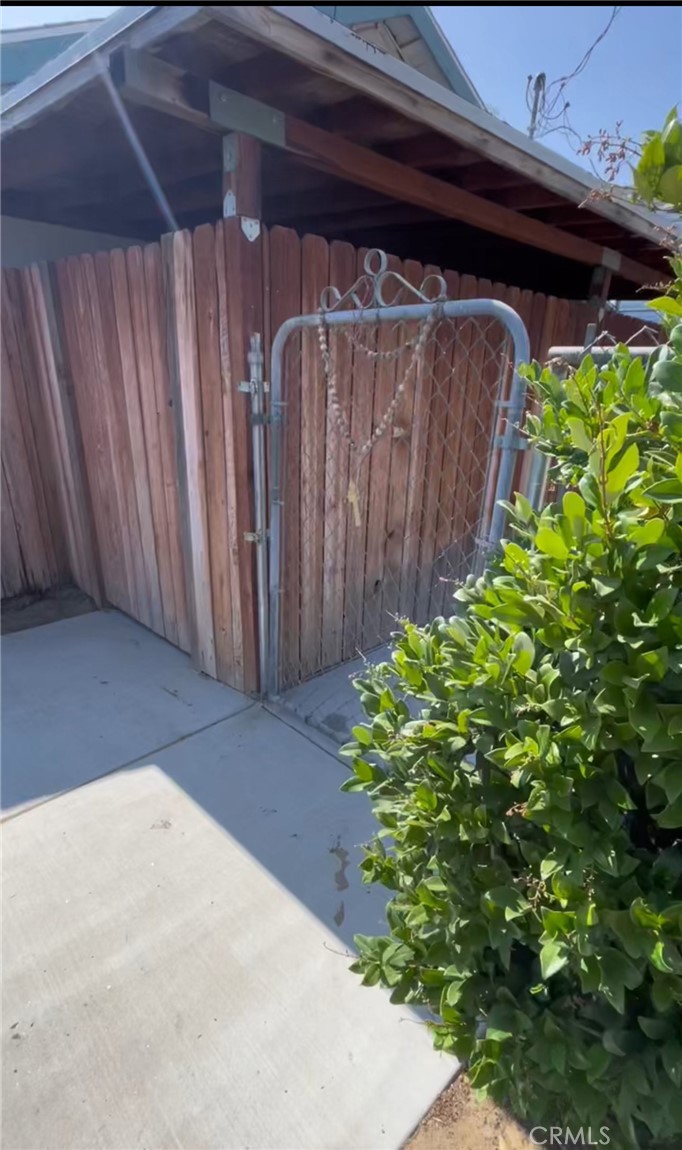 10520 Jurupa Road Jurupa Valley, CA 91752 - Photo 6 of 7 Side House Entrance