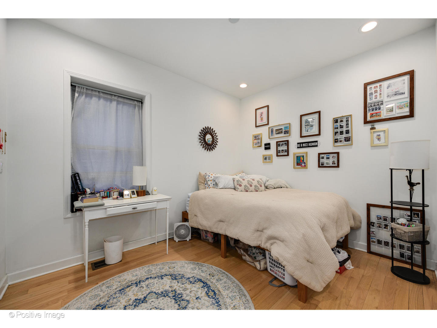 1330 West Roscoe Street Chicago, IL 60657 - Photo 19 of 26 a spacious bedroom with a bed and a desk