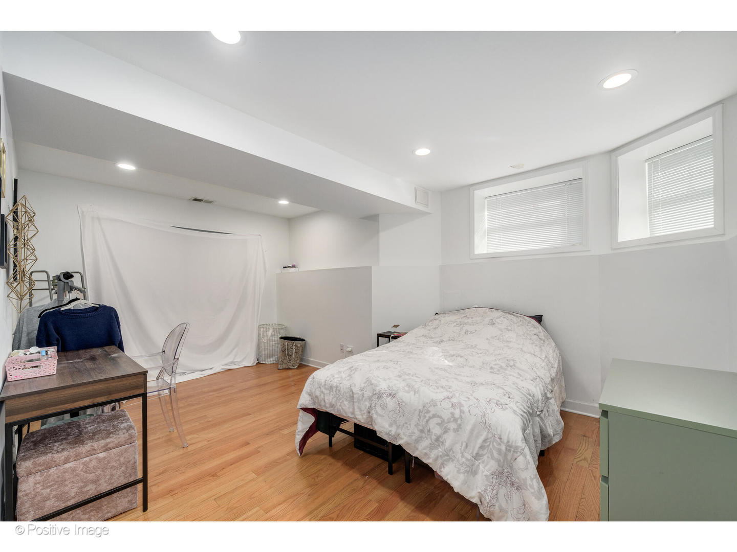 1330 West Roscoe Street Chicago, IL 60657 - Photo 20 of 26 a living room with furniture and a wooden floor