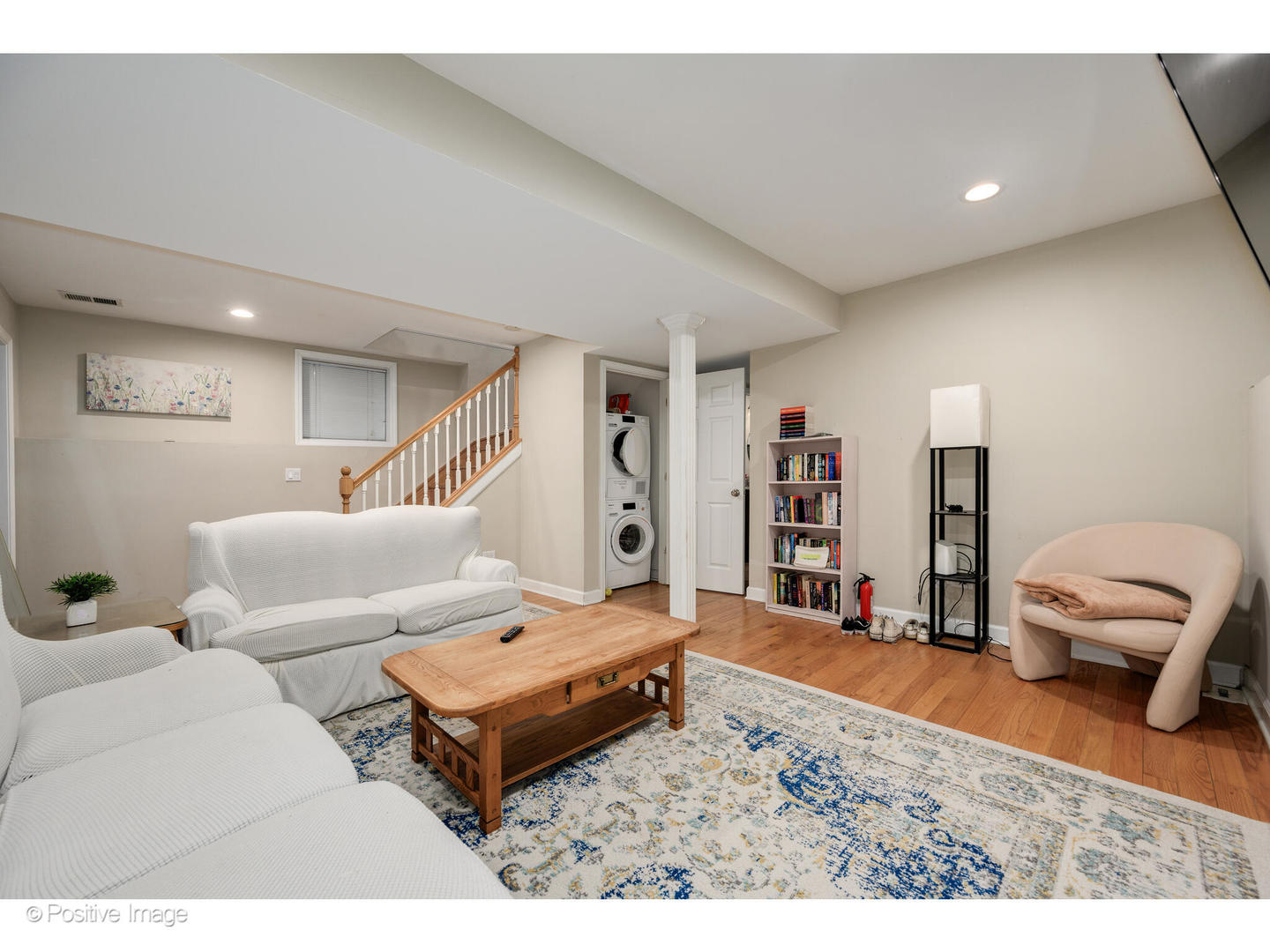 1330 West Roscoe Street Chicago, IL 60657 - Photo 22 of 26 a living room with furniture and a wooden floor