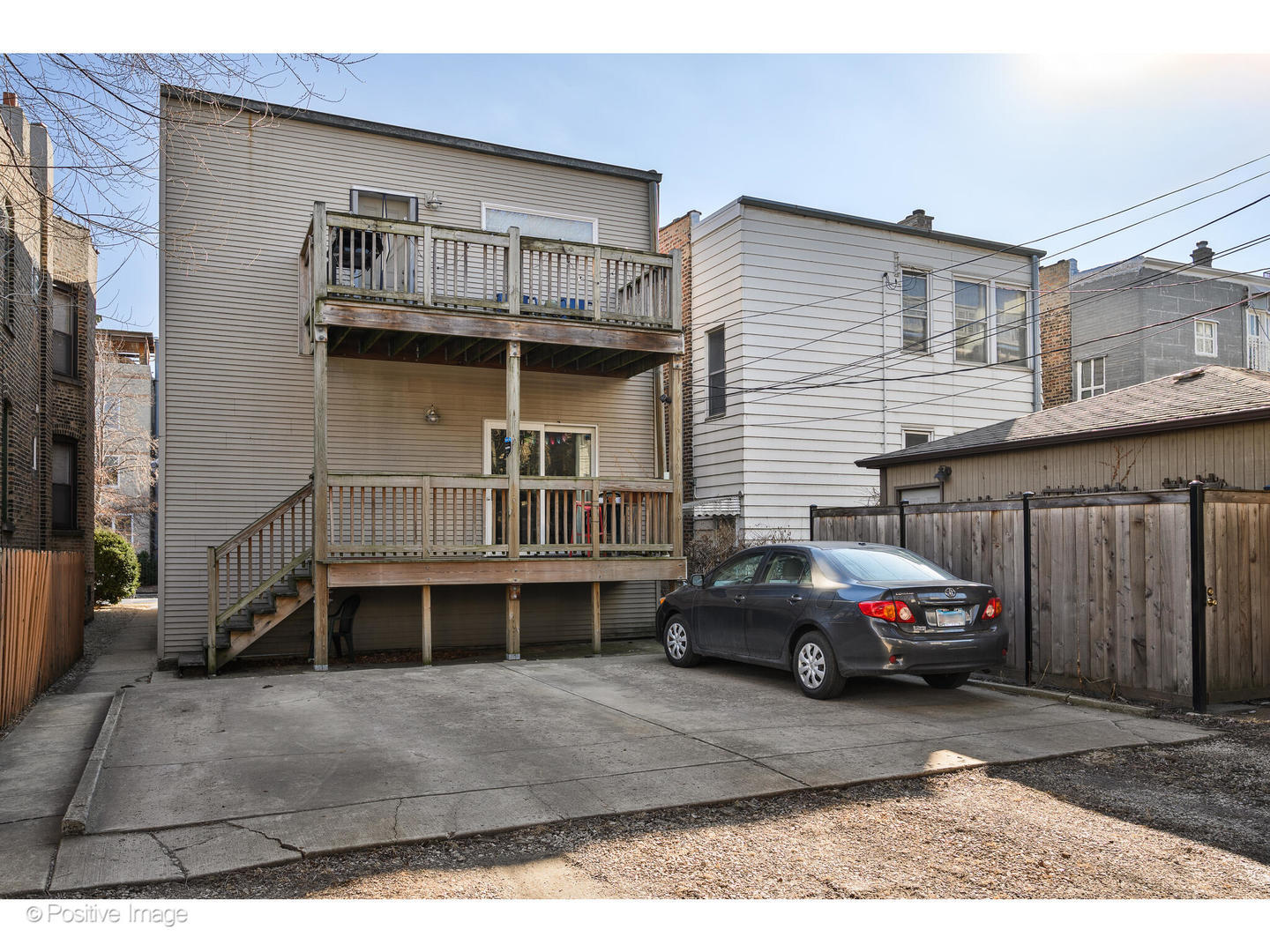 1330 West Roscoe Street Chicago, IL 60657 - Photo 26 of 26 a car parked in front of a house
