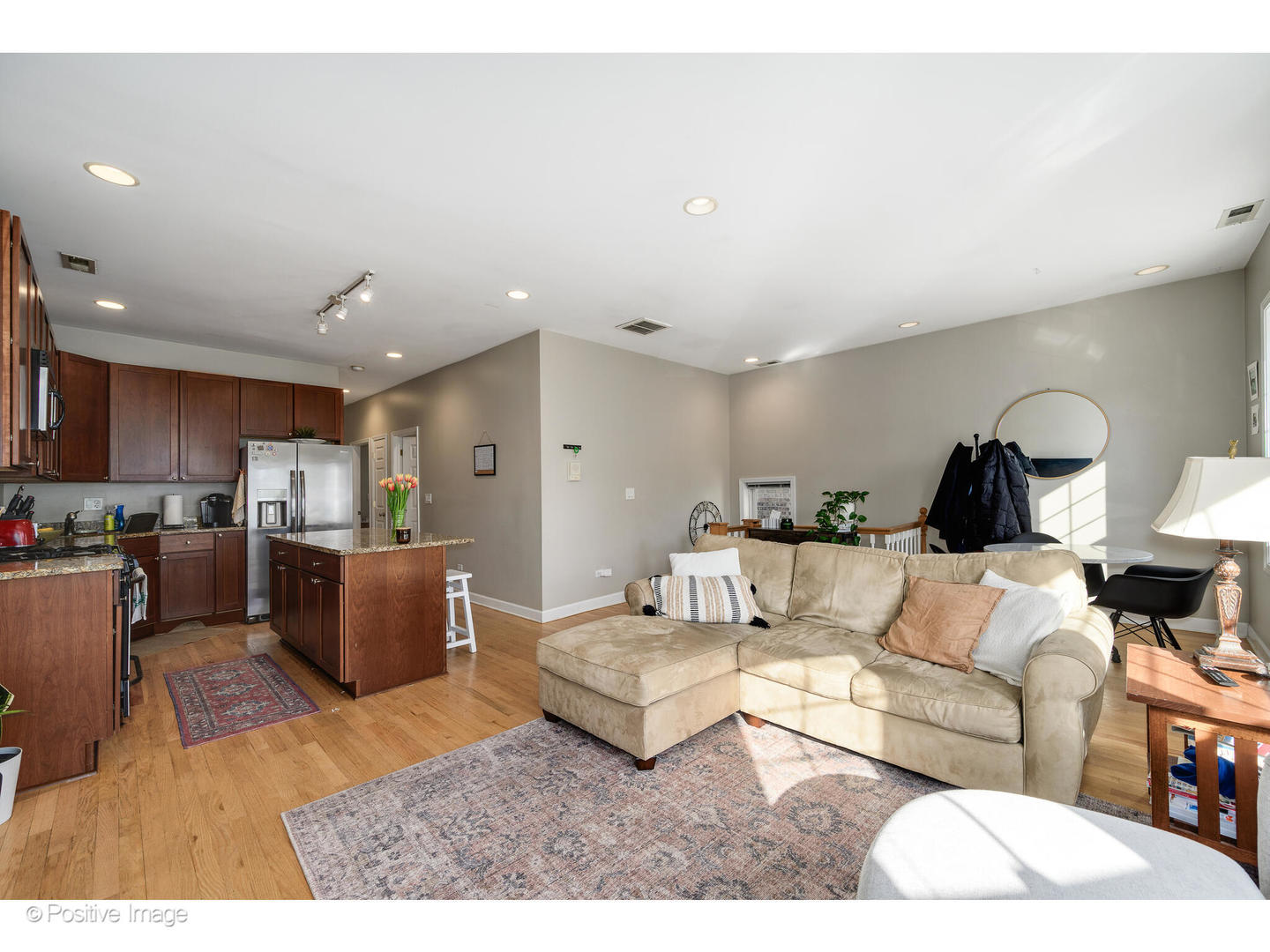 1330 West Roscoe Street Chicago, IL 60657 - Photo 5 of 26 a living room with furniture and a wooden floor