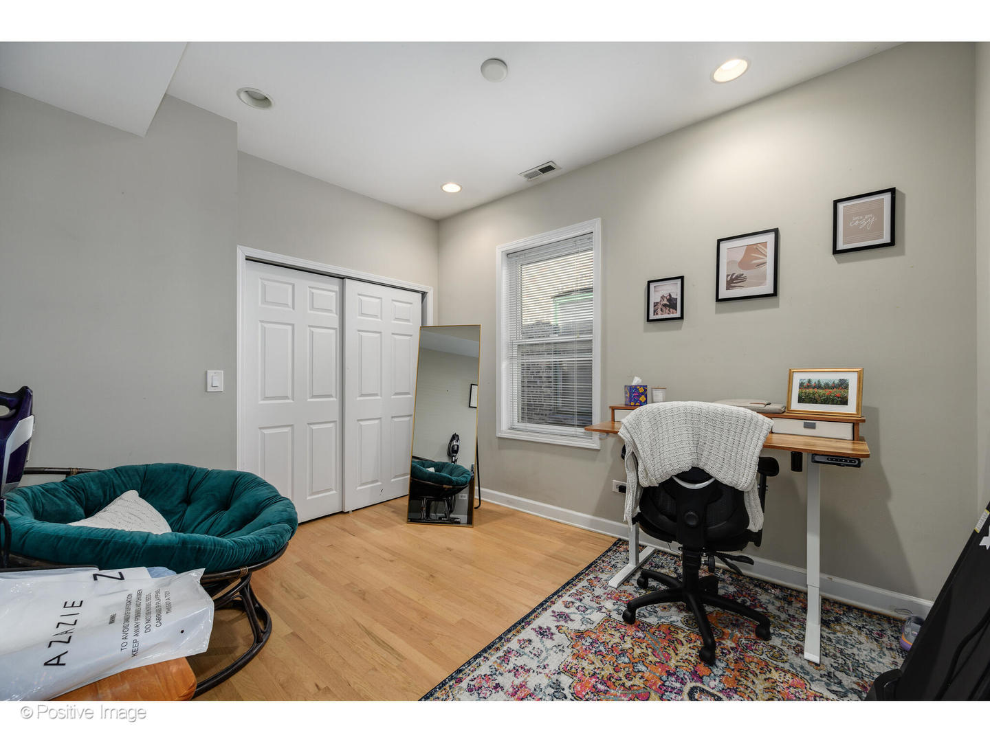 1330 West Roscoe Street Chicago, IL 60657 - Photo 10 of 26 a living room with furniture a rug and a window