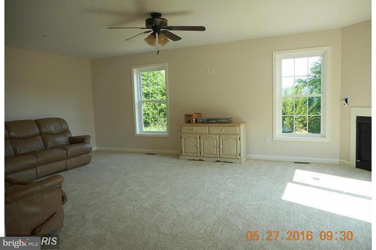 25136 Adams Landing Road Denton, MD 21629 - Photo 3 of 13 16x24 family room with vaulted ceiling