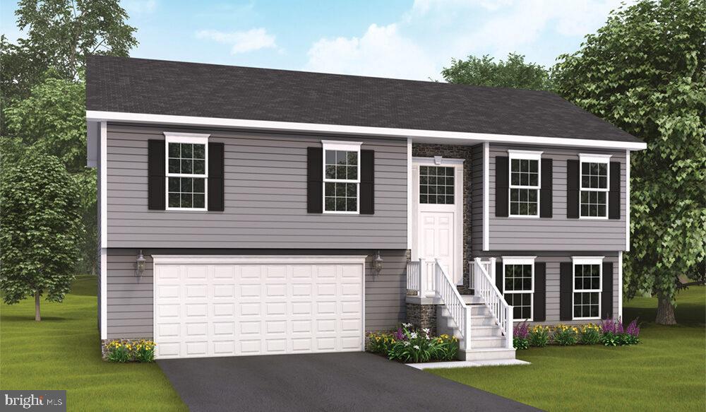 24 Meadow Lane, Unit 18 Hanover, PA 17331 - Photo 1 of 21 a front view of a house with a yard