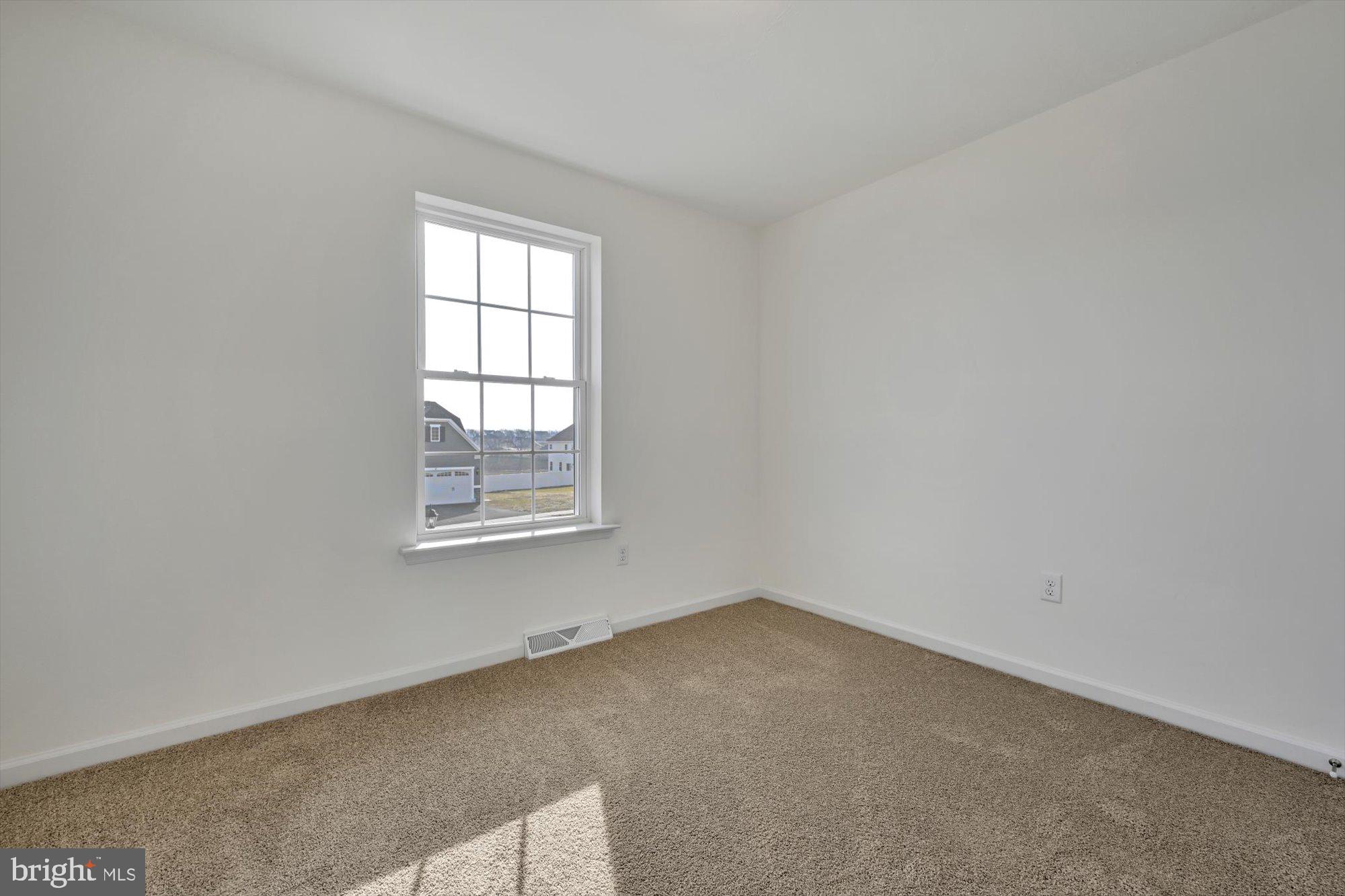 24 Meadow Lane, Unit 18 Hanover, PA 17331 - Photo 12 of 21 an empty room with a window