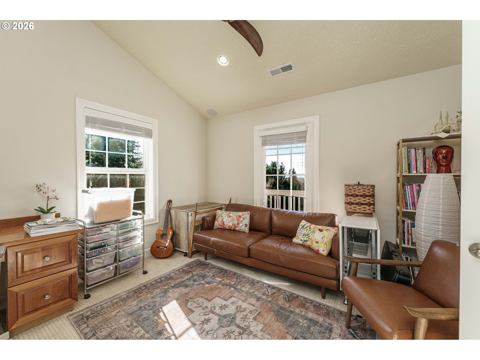 19121 Northwest 61st Avenue Ridgefield, WA 98642 - Photo 19 of 39 a living room with furniture and a window