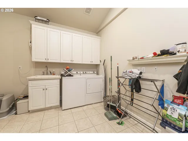 a utility room with cabinets