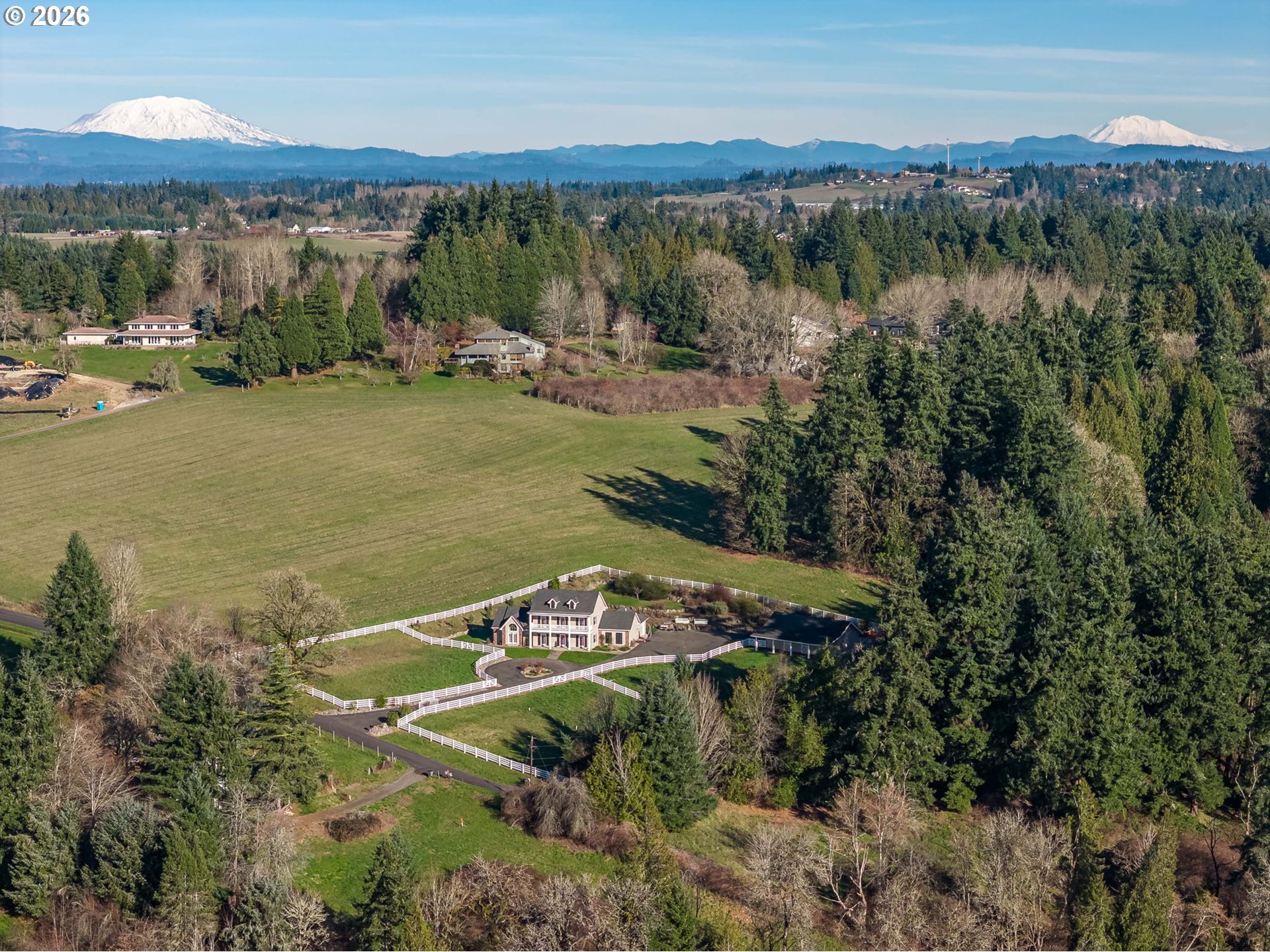 19121 Northwest 61st Avenue Ridgefield, WA 98642 - Photo 3 of 39 a view of a lake in middle of forest