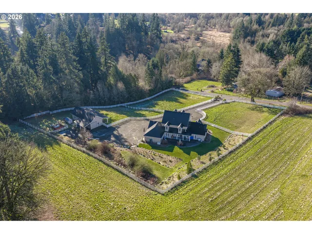 a view of a swimming pool with a yard