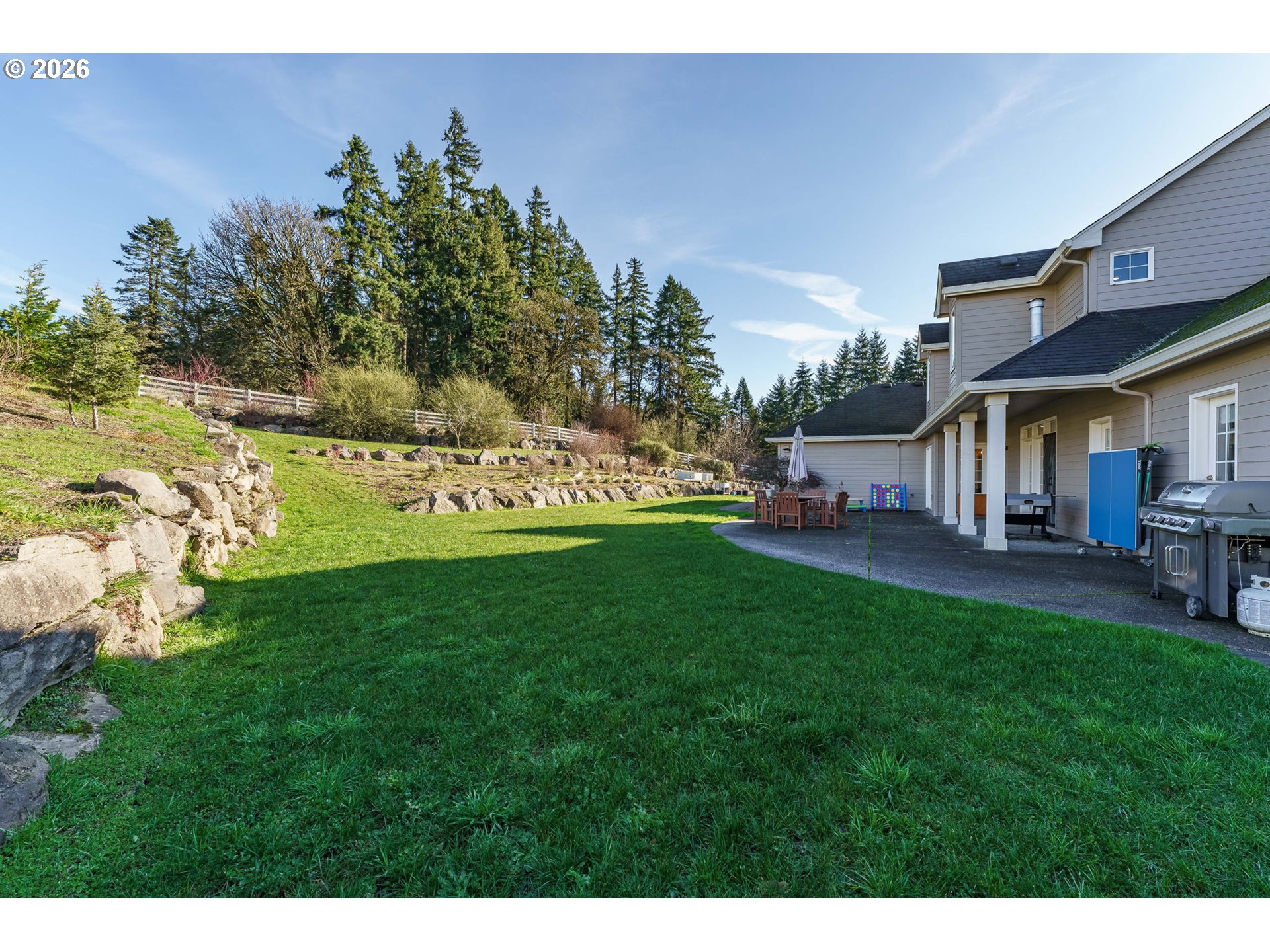 19121 Northwest 61st Avenue Ridgefield, WA 98642 - Photo 37 of 39 a view of yard with swimming pool and green space