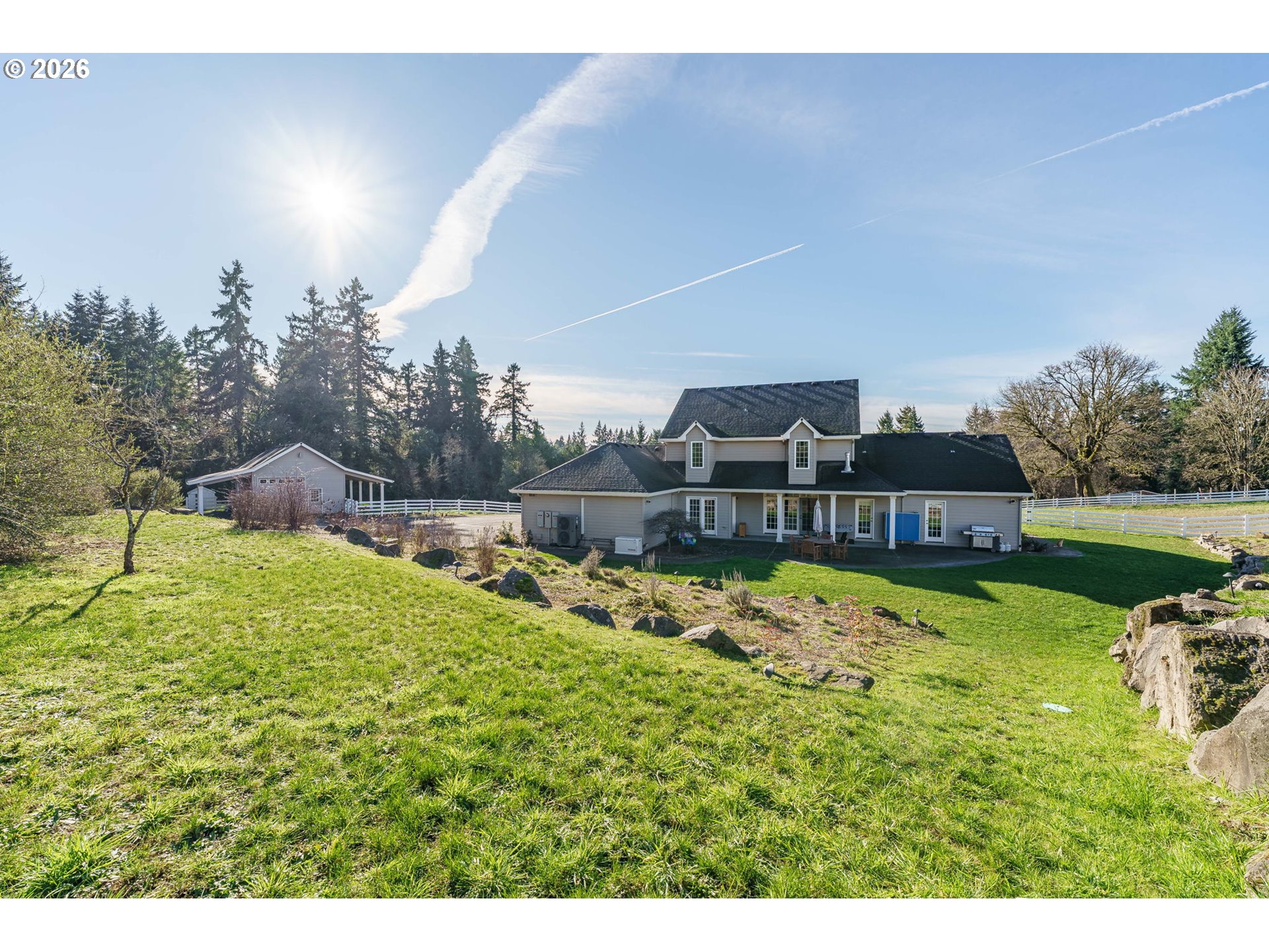 19121 Northwest 61st Avenue Ridgefield, WA 98642 - Photo 38 of 39 a view of a house with a yard