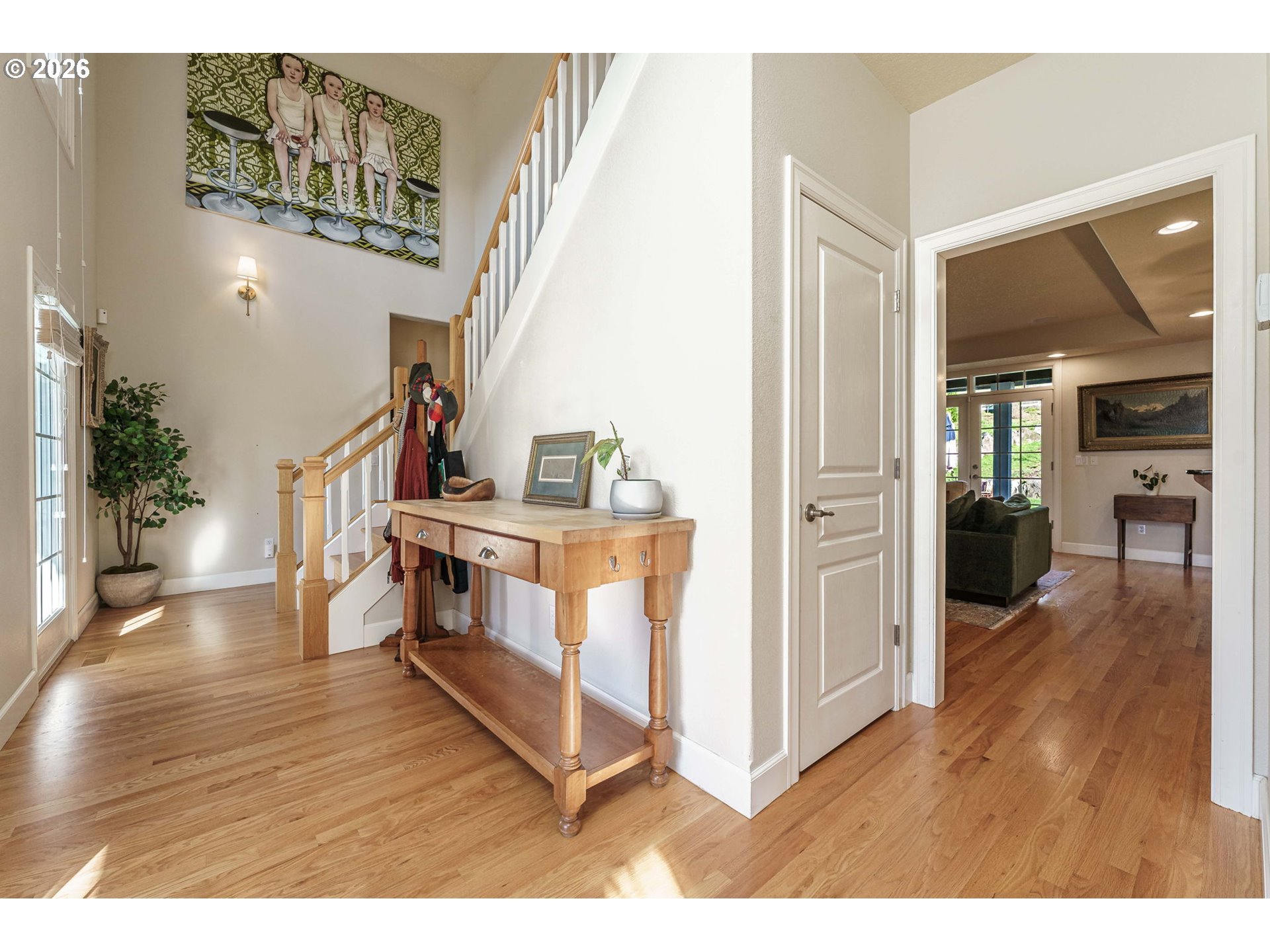 19121 Northwest 61st Avenue Ridgefield, WA 98642 - Photo 6 of 39 a view of entryway livingroom and hall with wooden floor