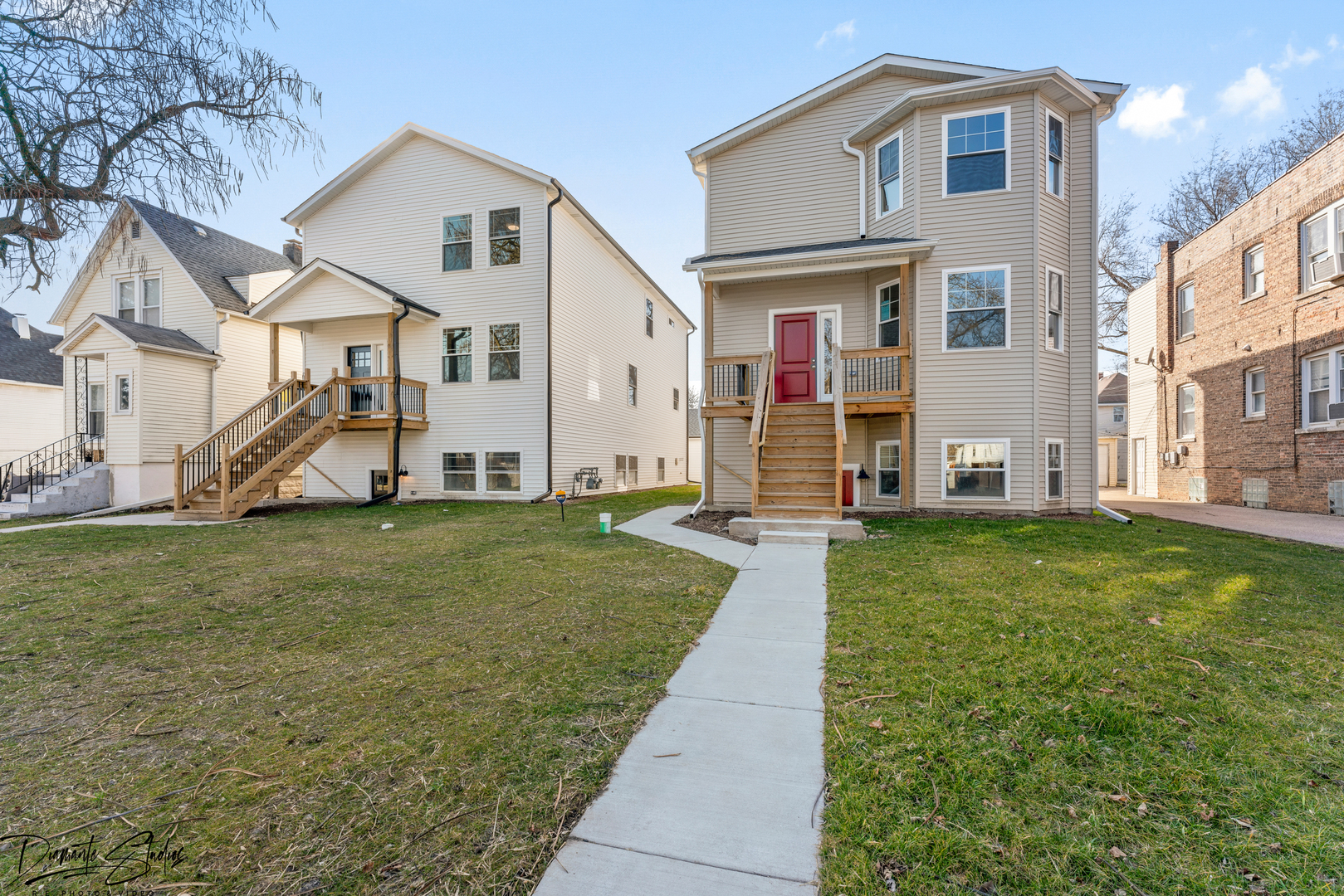 124 South 13th Avenue Maywood, IL 60153 - Photo 1 of 1 a view of a yard in front of a house