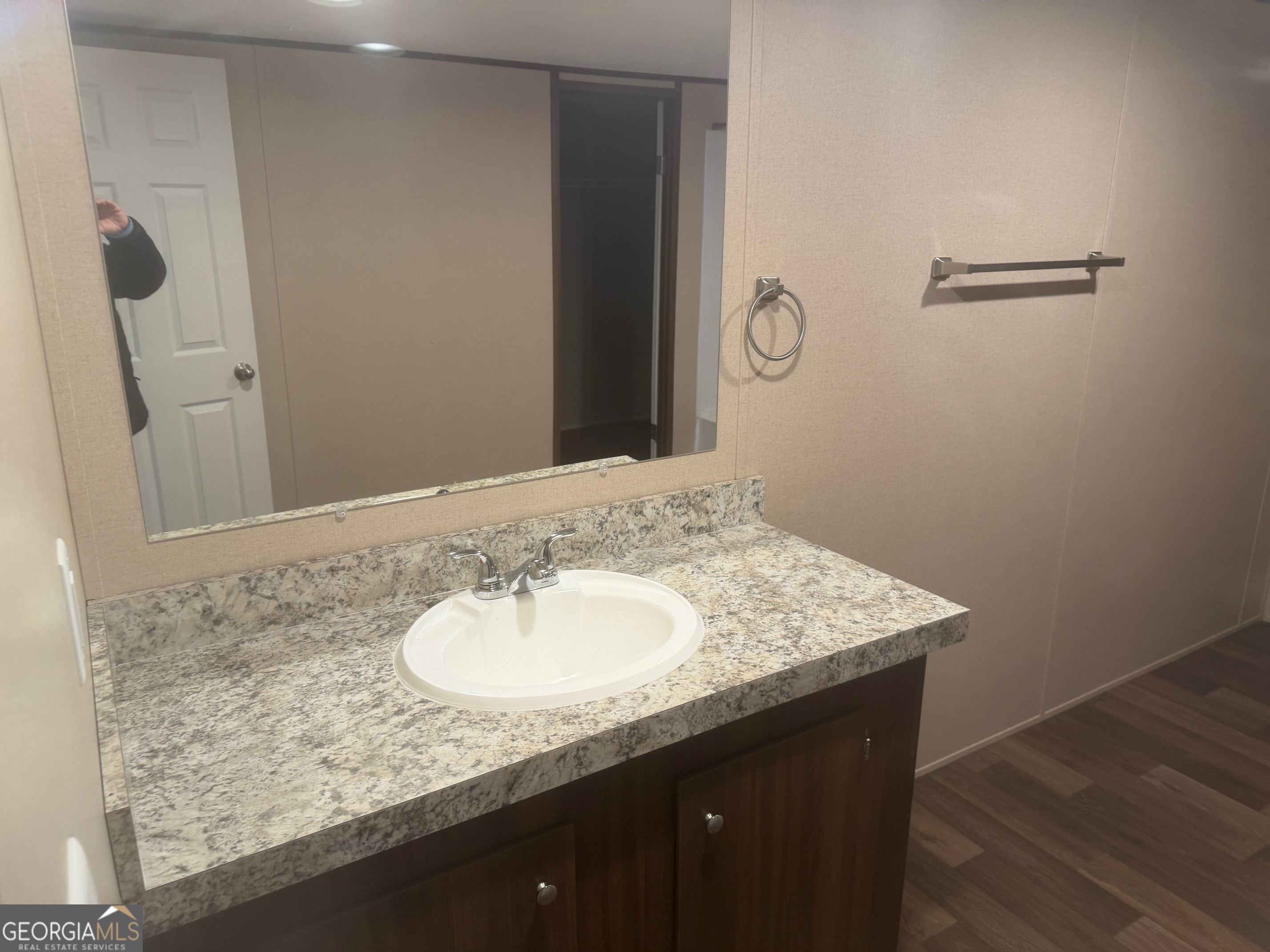 832 Stone Stewart Road Hull, GA 30646 - Photo 12 of 15 a bathroom with a granite countertop sink and a mirror