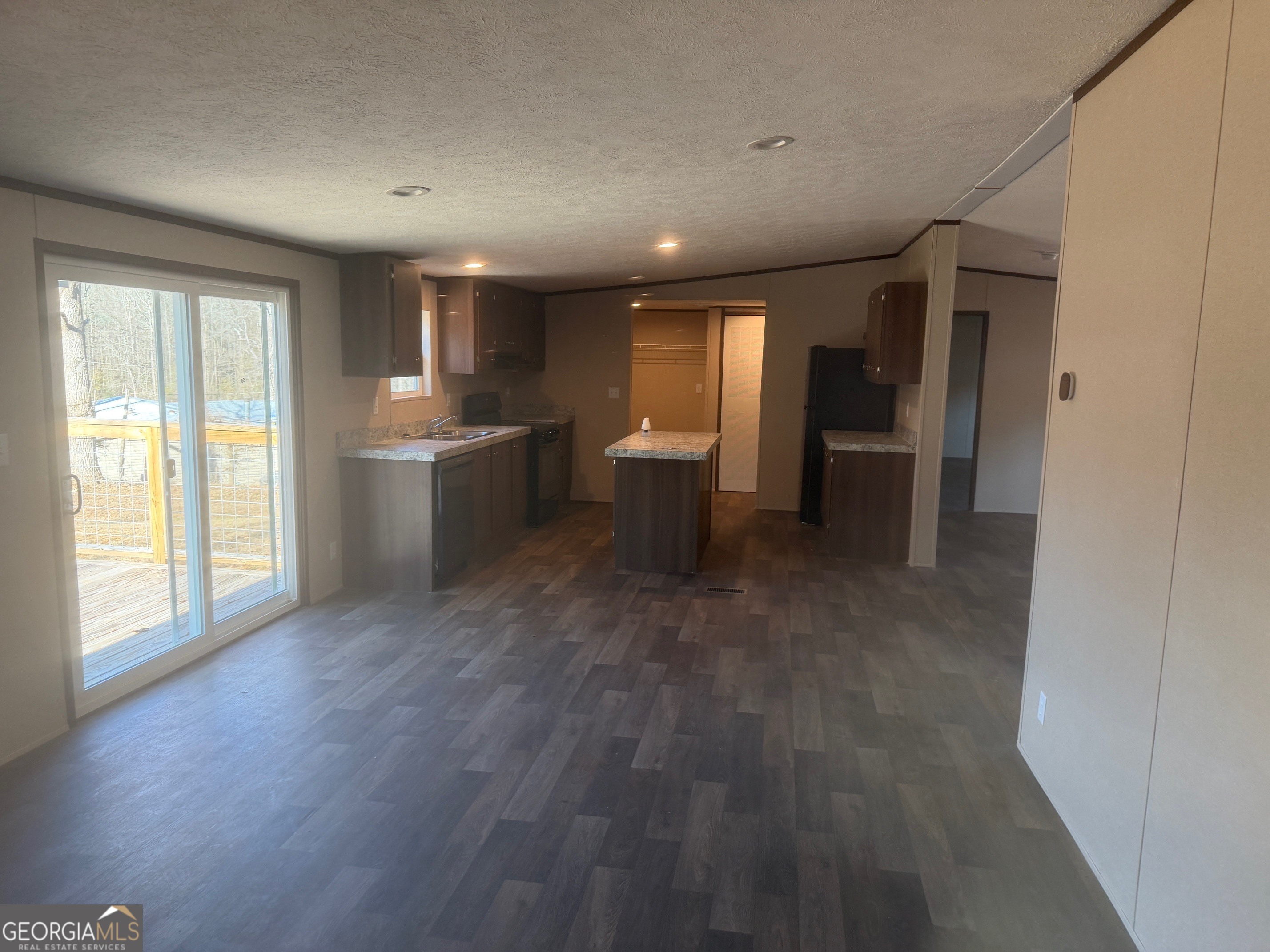 832 Stone Stewart Road Hull, GA 30646 - Photo 2 of 15 a view of a kitchen and dining room