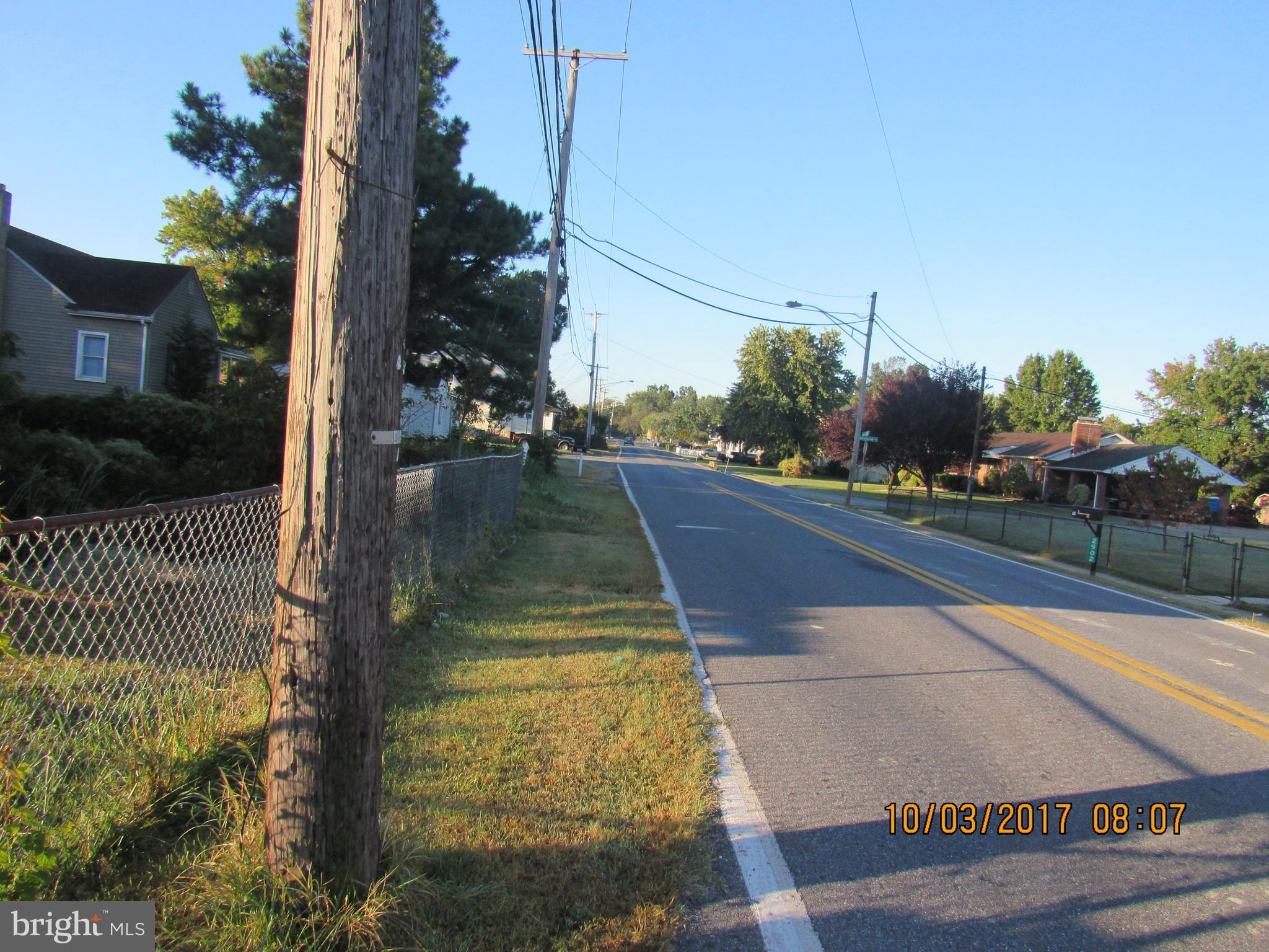 2907 Sparrows Point Road Baltimore, MD 21219 - Photo 2 of 24 a view of a yard in front of a house