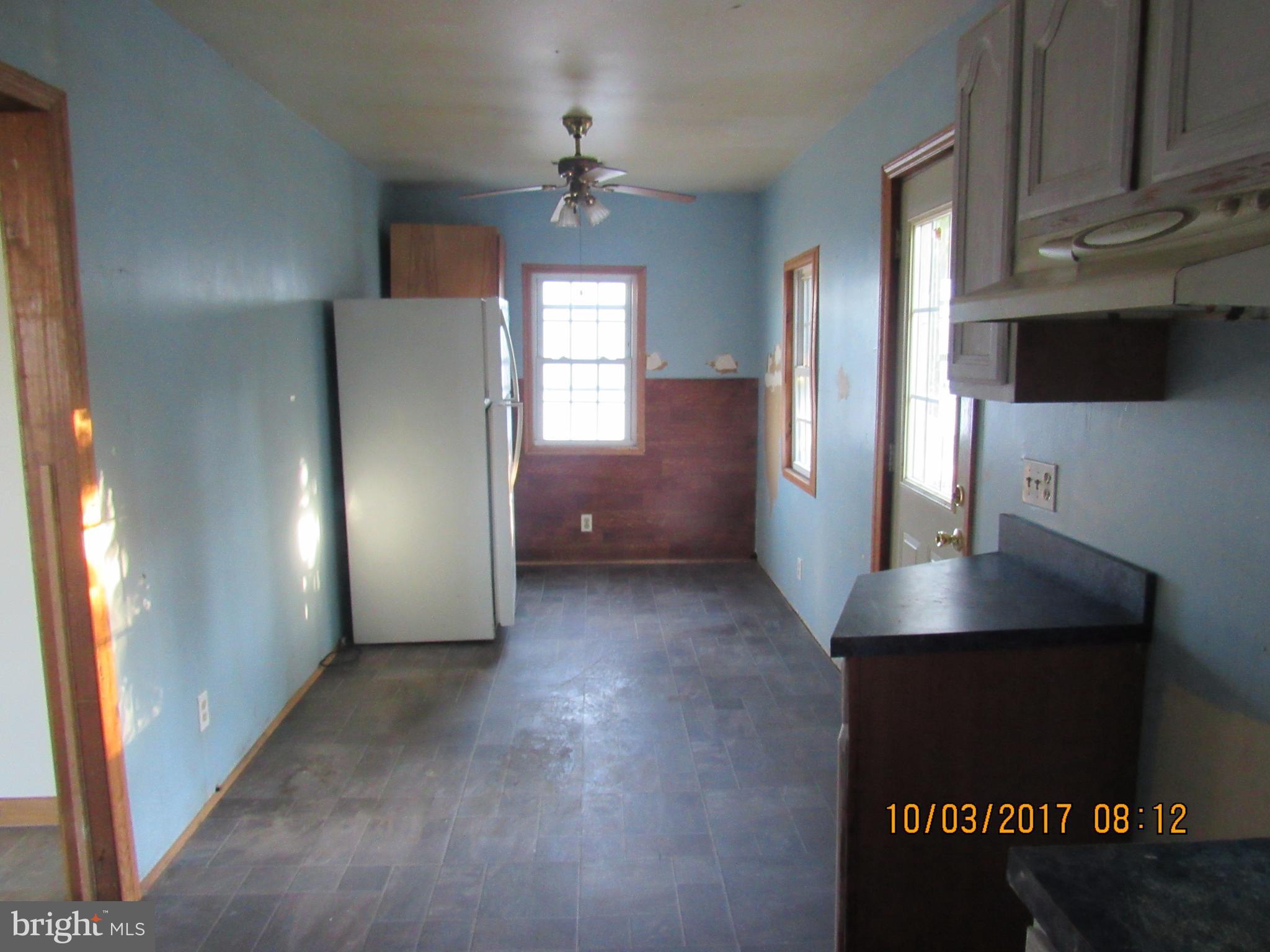 2907 Sparrows Point Road Baltimore, MD 21219 - Photo 9 of 24 a view of livingroom with furniture and windows