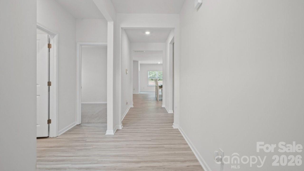 3688 Mercer Street Terrell, NC 28682 - Photo 19 of 34 a view of a hallway with wooden floor